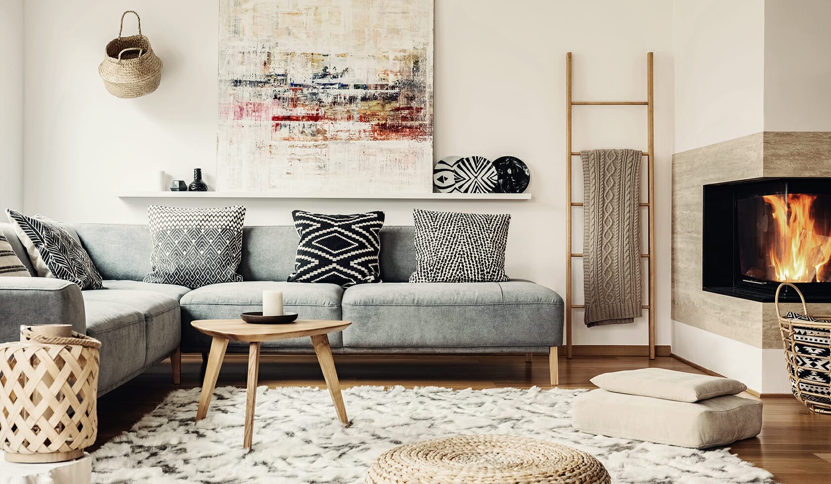 Stylish home living room with a fireplace and textural linens.